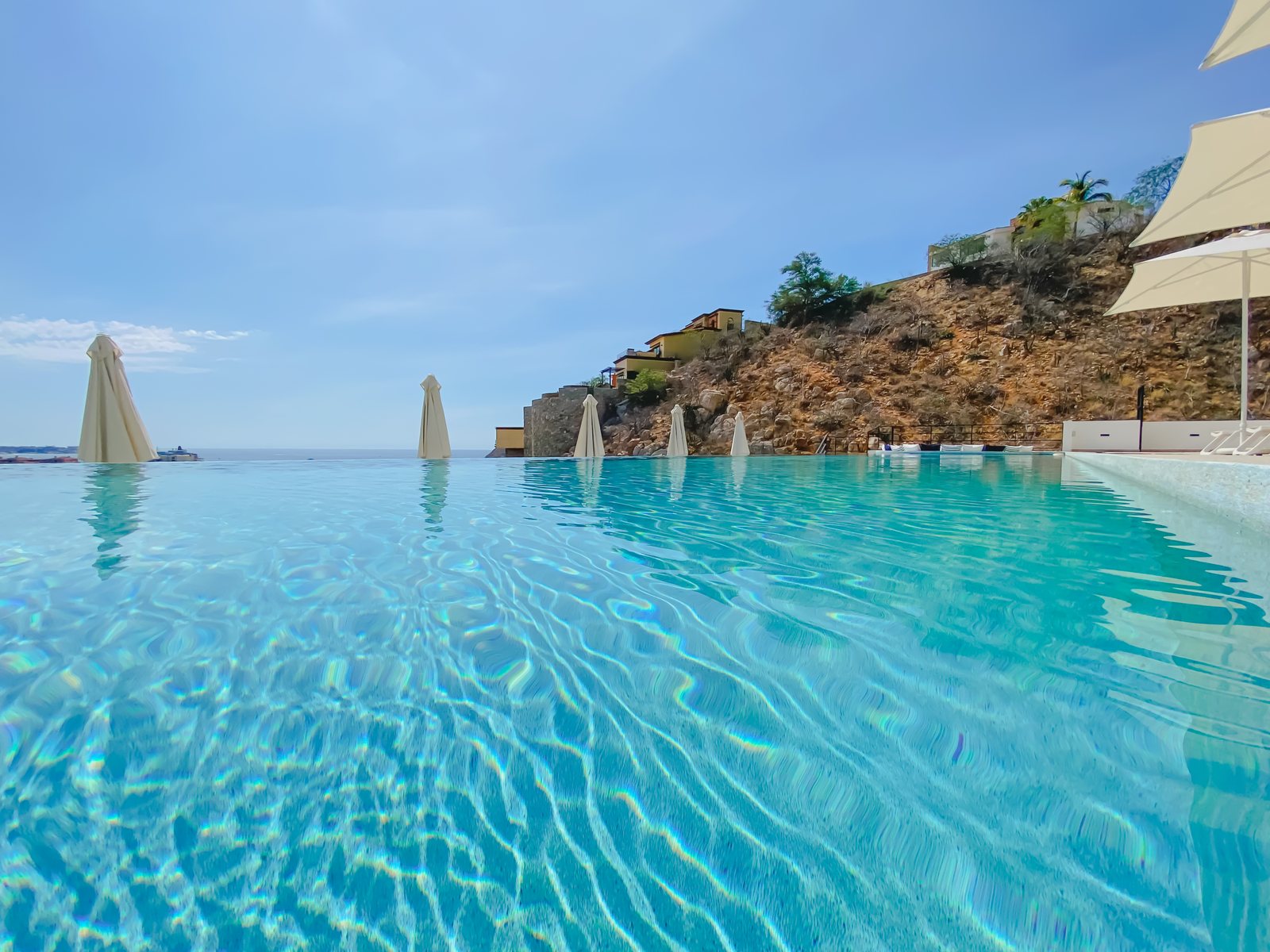 Infinity pool at Montemar with the Pacific beyond the edge
